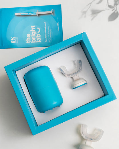 Close view of the 6% take-home whitening gel sachet showing a 3g applicator
